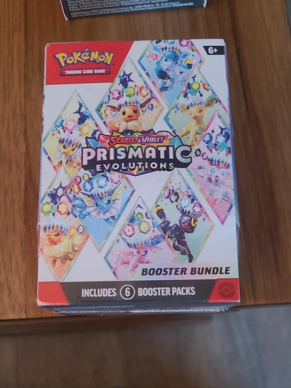 Pokémon Prismatic Evolutions Booster Bundle - White with Multicolor Art